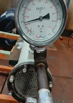 Shell and tube heat exchanger testing with pressure gauge
